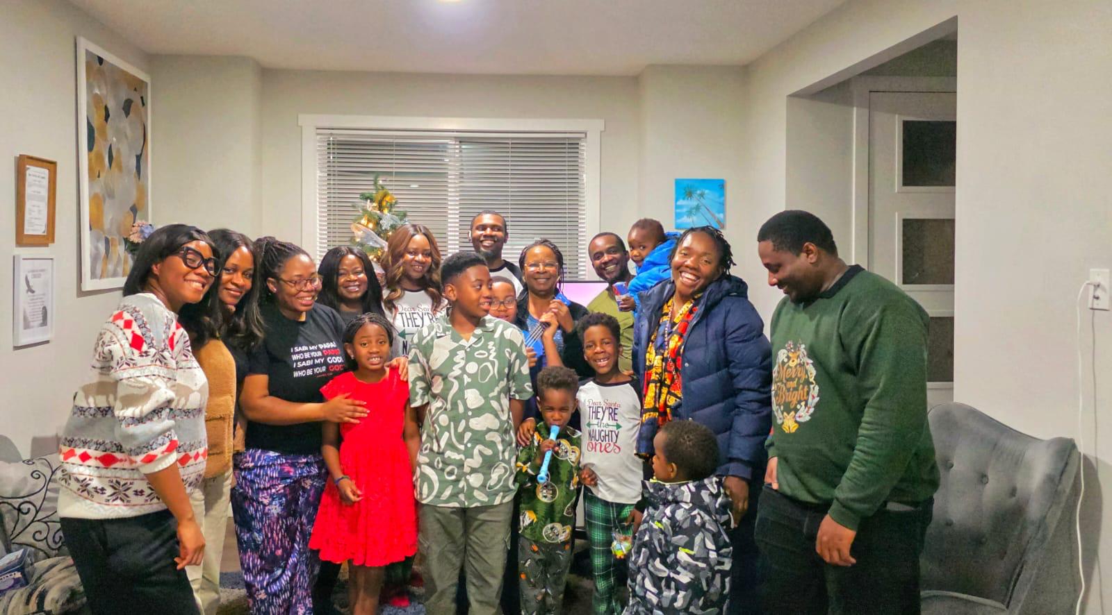 Extended family gathered together at home during the holidays, representing everyday family connection